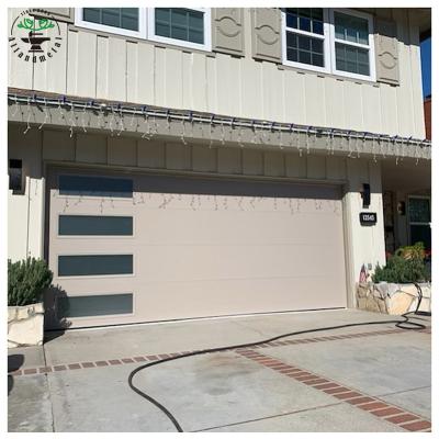 China Modern Design Windproof Frameless Flush Automatic Garage Door With Tempered Glass Windows for sale