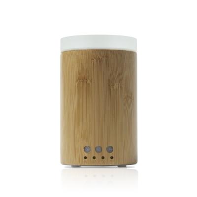 China Hotel Verified Factory Customized Label Bamboo Diffuser With Glass Lid Rotating Mood Light For Home Appliance for sale