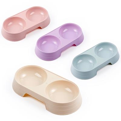 China Sustainable Plastic Cat and Dog Macarons Double Bowl Feeding Pet Supplies and Double Drinking Bowl for sale