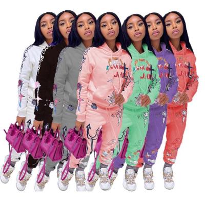 China QUICK DRY women's sweaters set loose hooded pattern printed sets for women two piece for sale