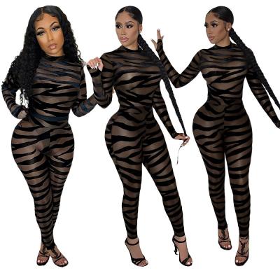 China QUICK DRY mesh see through nightclub women rompers leopard patchwork long sleeve one piece jumpsuit for sale