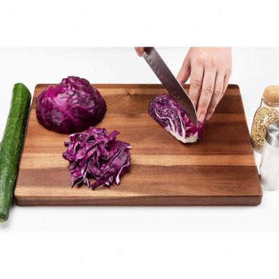 China 2021 Viable Country Retro Thickened Cutting Boards Cut Cheese Vegetable Walnut Wood Cutting Board for sale