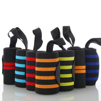 China 2021 Hot Selling Logo Adjustable Weightlifting Training Gym Breathable Custom Wrist Support Wraps With Thumb Loops for sale