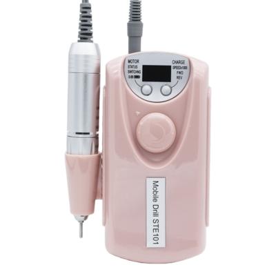 China Professional Nail Art Beauty Strong 30000 RPM Cordless Recharge Portable Radio Electric Nail Drill Machine for sale