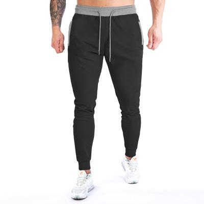 China New Sustainable Men's Fitness Sport Running Zipper Slim Foot Jogger for sale