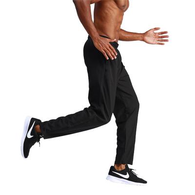 China Anti-wrinkle men's sports slim running fitness pants basketball training quick-drying pants for sale