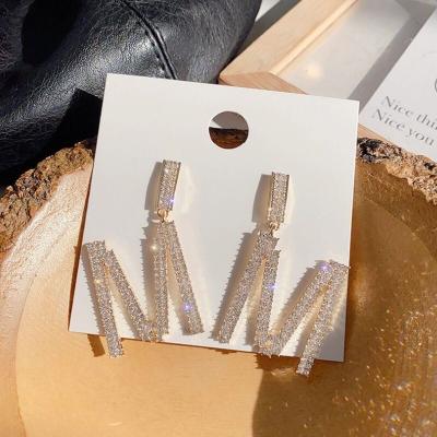 China BOHEMIA New M American Overdone Cheap Full Diamond Letter Earrings for sale