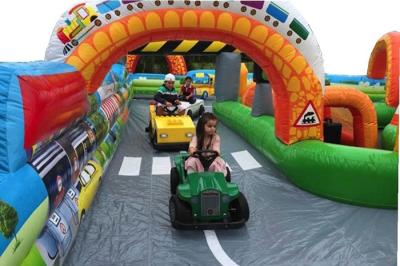 China Kindergarten Baby Inflatable Fun City Football Blow Up Tunnels For Outdoor Activities for sale