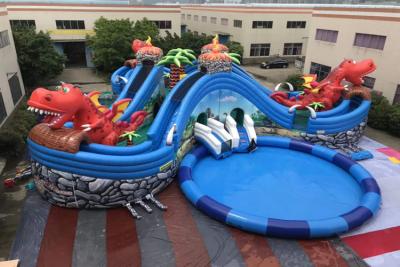 China 0.55mm PVC Tarpaulin Inflatable Jurassic Park With Slide And Pool for sale