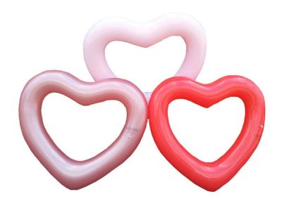 China Inflatable Love Shape PVC Swimming Ring For Adults 1 Year Warranty for sale