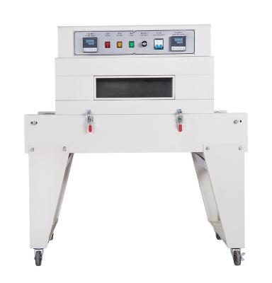 China Food Home Use PVC POF Film Heat Shrink Wrapping Machine for sale