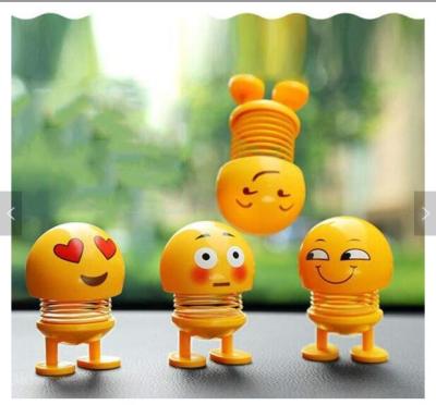 China MODEL TOY 2019 New Design Smile Face Spring Bouncing Car Smiley Doll Desktop Dolls for sale