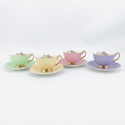 China Viable Ceramic Tea Cups And Saucers With Colorful Rim Gold Stoneware Coffee Mugs British Tea Cup Set Of 4 for sale