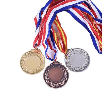 China Customized With Ribbon Logo Cheap Gold Silver Copper Sports Award Medal Metal Blank Champion Medal zu verkaufen