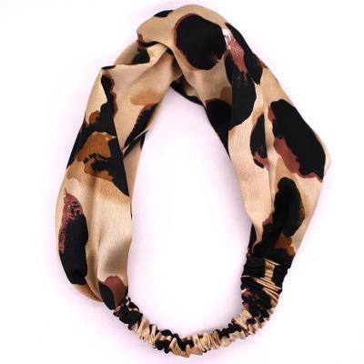 China Silk Knotted Wrap 1pc Elastic Hair Decoration Women Turban Satin Twist Leopard Print Hair Band for sale