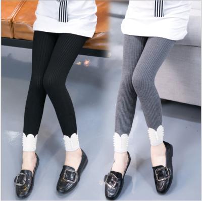 China 661 Casual Kids Clothes Solid Color Triplex Kids Leggings Girls Toddler Girls Running Ruffle Leg Warmers for sale