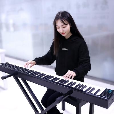 China Newest Digital Piano 88 Keys Electronic Portable Keyboard Li-Battery Midi Piano for sale