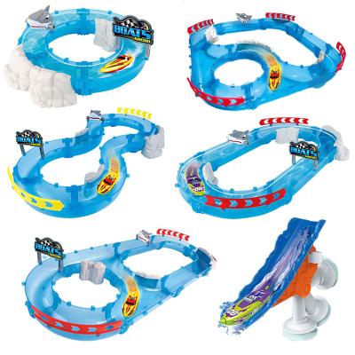 China Toy Summer Play Water Track Toy Set Shark Scene Electronic Slot Induction Regatta Water Railroad for Kids Indoor and Outdoor Game Toys for sale