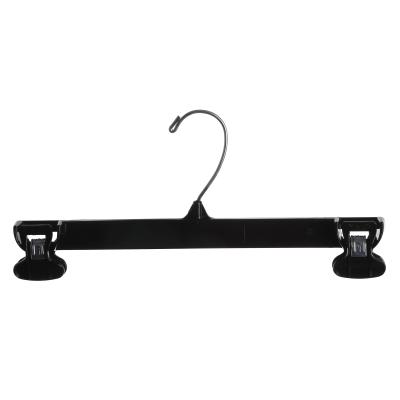 China Bottoms Anti-Slip Plastic Hangers For Skirts And Pants Hanger With Clips for sale