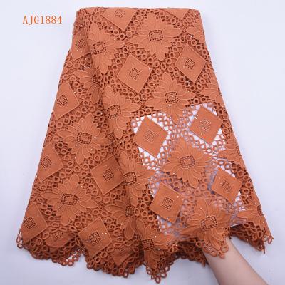 China Viable orange african rope lace for wedding dress guipure print lace fabric 1884 water soluble the new high quality lace fabric for sale