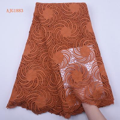 China Viable Nigerian Guipure Lace For Wedding Dress African Water Soluble Lace Fabric Embroidery Chemical Rope Lace Fabric 1883 for sale