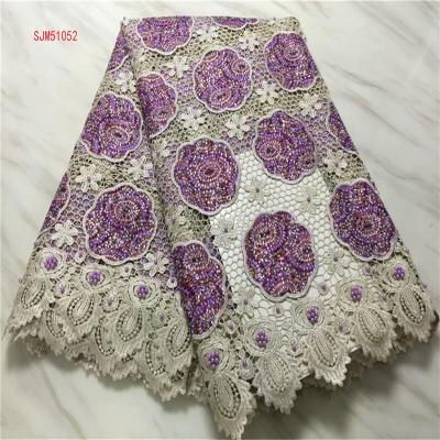 China Viable Wholesale African Rope Lace Fabric With Stones Sewing Material French Milk Silk Lace Fabric For Dress Wedding Bridal for sale