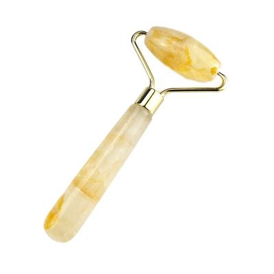 Chine Outils de massage du visage Rouleau facial jaune naturel de citrine 100% de jade naturel Massageur pour massage musculaire Produits de soin de la peau à vendre