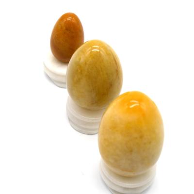 China Regional Feature Yellow Jade Eggs Kegel Exercise Semi Precious Stone Eggs For Love Theme for sale