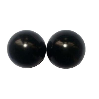 China Carved 50mm Natural Black Bian Stone Hand Ball Massaging Smooth Healing Crystal Sphere for Body Massage and Healing for sale