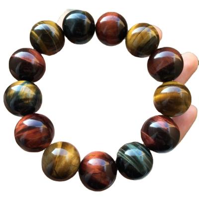 China Bracelete de pedra natural de olho de tigre acessório de moda exótico colorido para amantes masculinos e femininos à venda