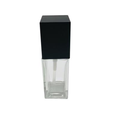 China Cosmetic high end clear square lotion bottle with black pump and black lotion dust cap 30ml for sale