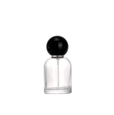 China New Design Perfume Mist Spray Bottle Bayonet Glass Clear Round Perfume Bottle With Ball Shape Cap for sale