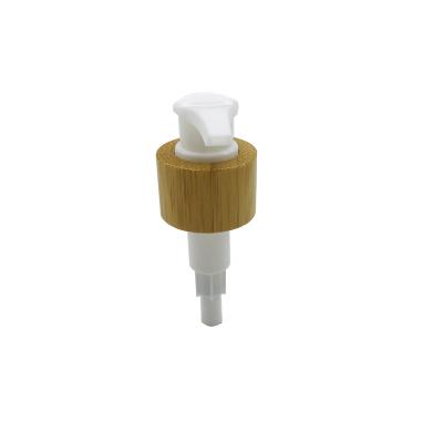 China Non Spill Wholesale White Plastic PP Lotion Dispenser Pump With Bamboo Wooden Collar For Shampoo Hand Sanitizer 20/410 for sale