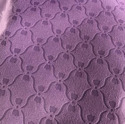 China Fabric Textile Yard Tear-Resistant Flower Embossed Embossing Fabric for sale