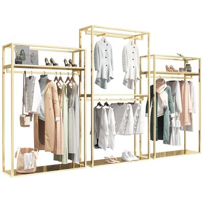 China Custom Clothing Store Clothes Display Racks Stores Stainless Steel Garment Shelving Gold Commercial Boutique Clothing Racks for Store for sale