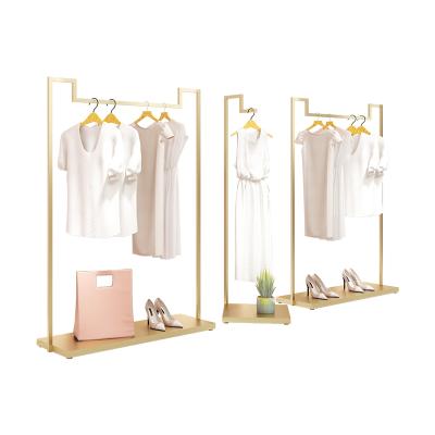 China Luxury Clothing Store Guangzhou Women Shop Shiny Clothing Store Chrome Stainless Steel Gold Boutique Furniture Display Rack Clothing for sale