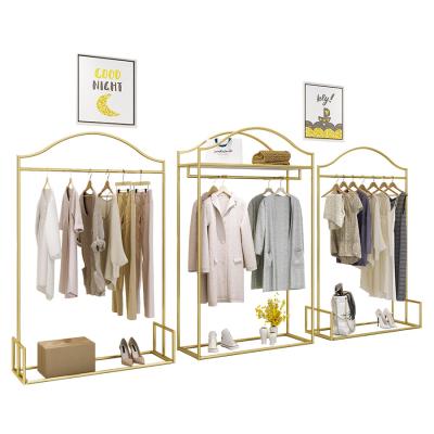 China Clothing store gold metal clothing rack clothing shelf for clothing store display rack wholesale for sale