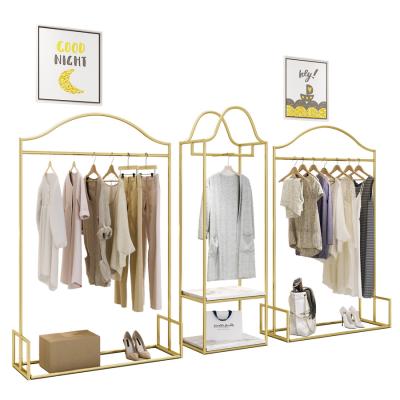 China The Shinny Clothing Store The Gold Display Rack Stainless Steel Clothing Rack Metal Rack Shelf For Store Sales for sale