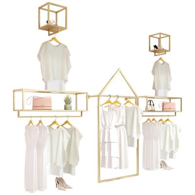 China Clothes Shop Polygon Lady Boutique Store Furniture Three-Dimensional Standing Wall Clothing Display Rack for sale