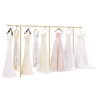 China Clothes shop commercial retail boutique store bridal decorations store wedding dress rack gold wall mounted clothing racks for wedding dresses for sale