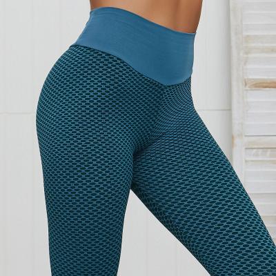 China New Breathable Sports Pants Hip Gaiters Yoga Pants High Waist Seamless Women's Yoga Pants for sale