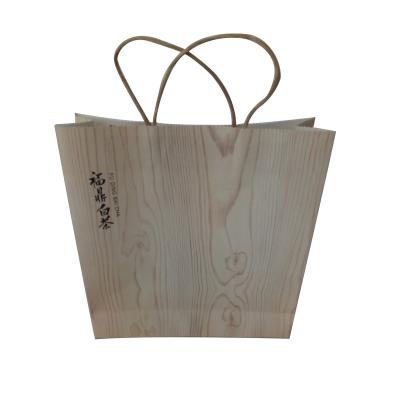 China Custom Creative Design Recyclable White Kraft Paper Carry Bag With Flat Paper Handle for sale