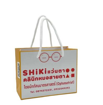 China New Design Disposable Art Paper Cardboard Custom Eyewear Glasses Carry Paper Bag For Glasses for sale