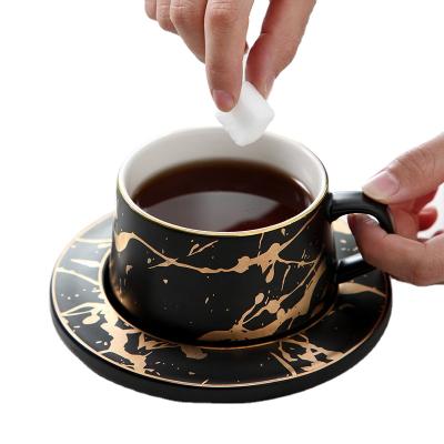 China Rts Sustainable Porcelain No Handle Arabic Coffee Mug With Unique Mirrored Cup And Saucer Set for sale