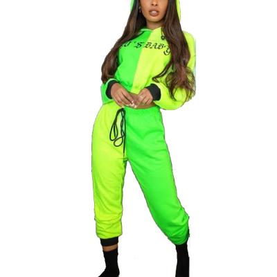 China Woman Green Color Neon Block Breathable Tracksuits Designs Latest Sets Women Two Piece Tracksuit for sale