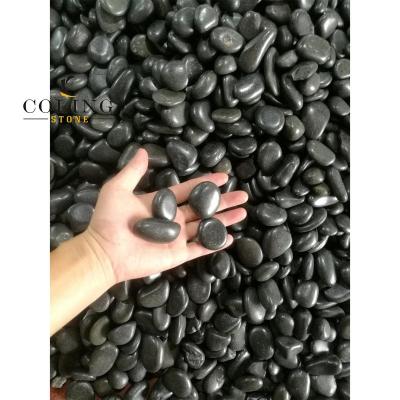 China Modern Black Pebbles And Pebbles Nature Stone Garden Pebbles For Gardens for sale