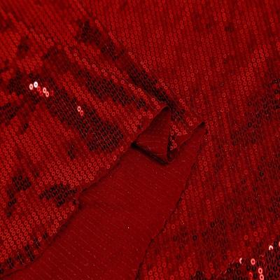 China 90%poly+10%spandex metallic knitting 3mm Rose Red glitter sequin fabric for clothes stage party wedding decoration for sale