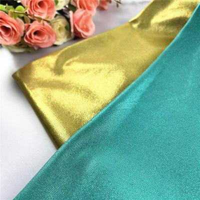 China Stage Cloth Foil Fabric Gold Green Metallic Thicker Dance Wear Tutu 4 Ways Stretch Garment Cloth Costume Diy Cosplay Fabrics 2021 for sale