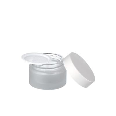 China Skin Care Cosmetic Packaging Face Cream Cream Jars Frosted 1oz Glass Cosmetic Jar With White Plastic Cap for sale