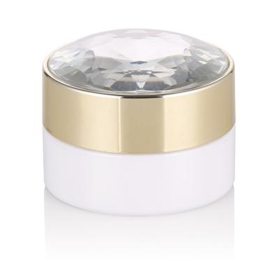 China Skin Care Cream Cosmetic Packaging 50g 50ml Cosmetic Jar White Plastic Container With Gold Cap And Diamond Top for sale